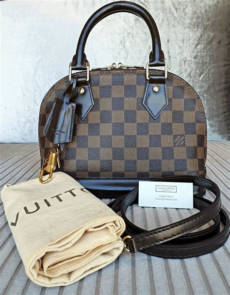 louis vuitton handbags on sale at macy's|macy's online shopping louis vuitton.